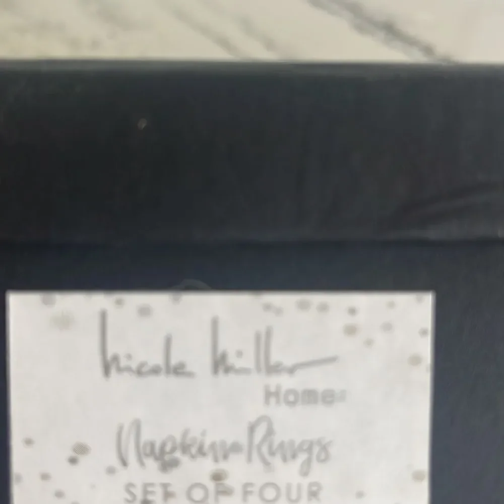 Nicole Miller Home Napkin rings.  Set of 6